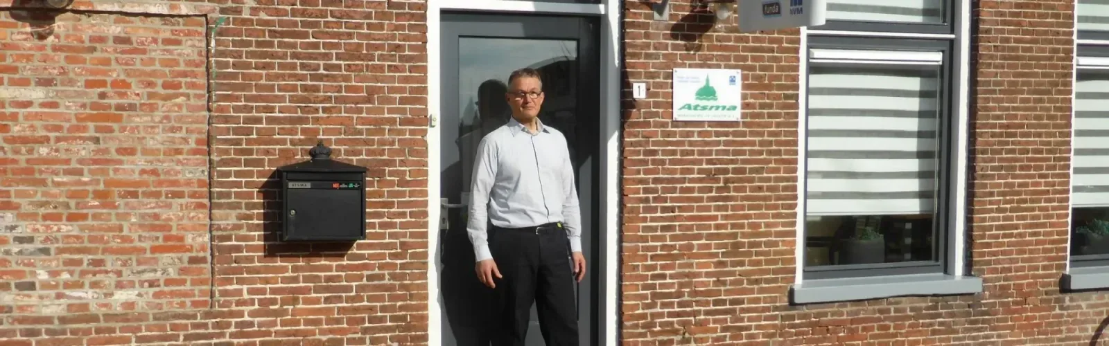 Team foto van Atsma makelaardij en taxatie