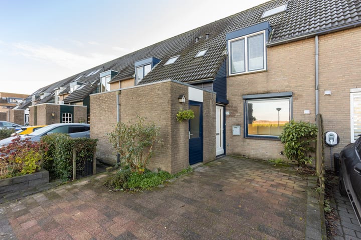 Photo of property Noordwal 37, Huizen