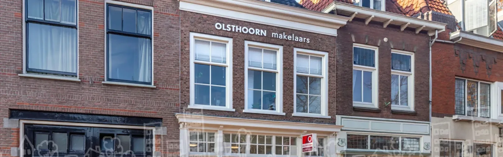 Team foto van Olsthoorn Makelaars Delft