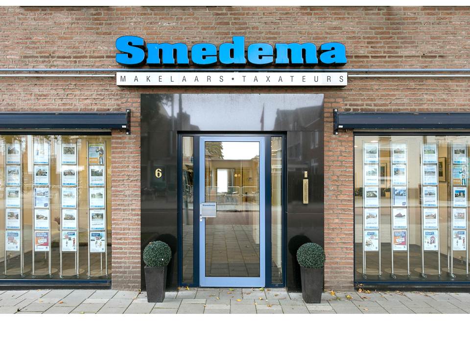 Logotipo Smedema Makelaars & Taxateurs