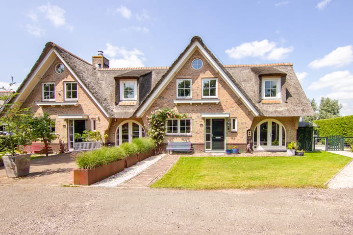 Veermolenweg 10 en Haarlemmerliede foto