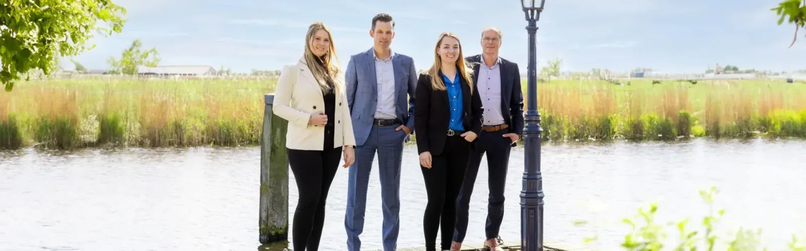 Team foto van Wonen aan water Makelaars Sneek