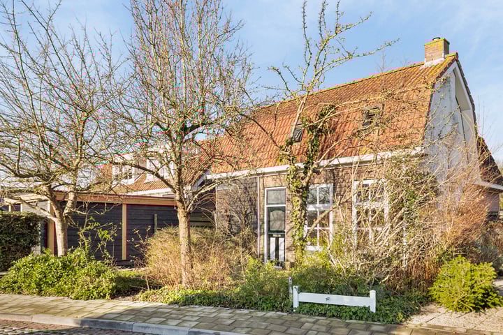 Photo of property Friesestraat 1, Wolphaartsdijk