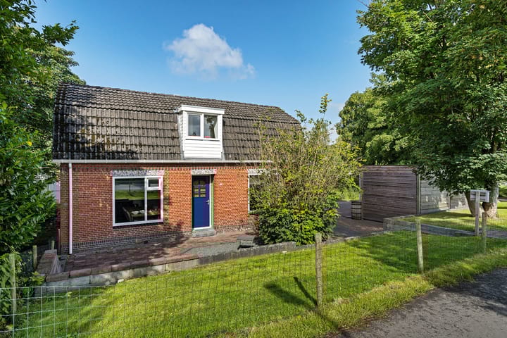 Photo of property Hoofdweg 63, Tjuchem