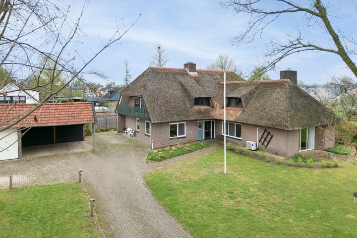 Photo of property Koninginneweg 15, Vroomshoop