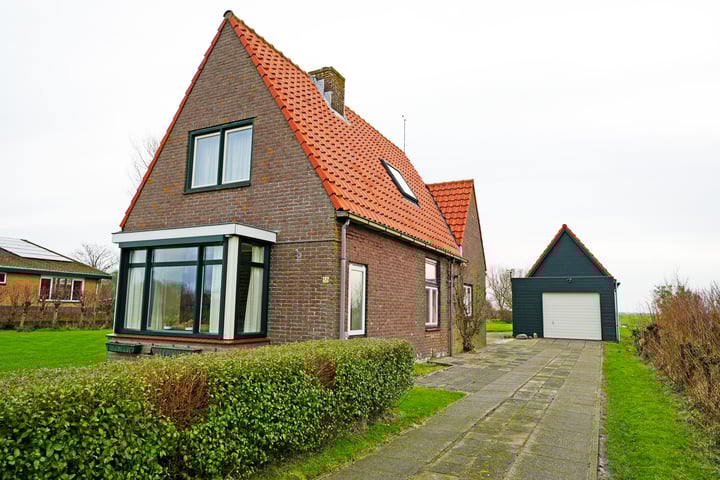 Photo of property Postweg 58, De Cocksdorp
