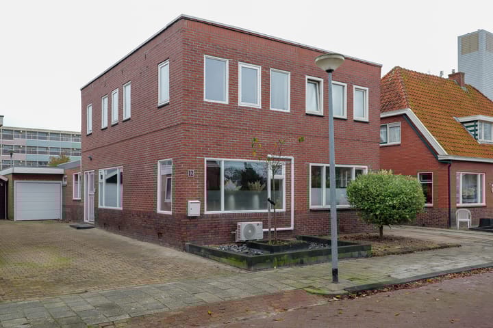 Photo of property Sportterreinstraat 12, Hoogezand