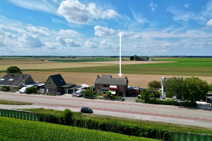 Photo of property Stougjesdijk 115, Mijnsheerenland