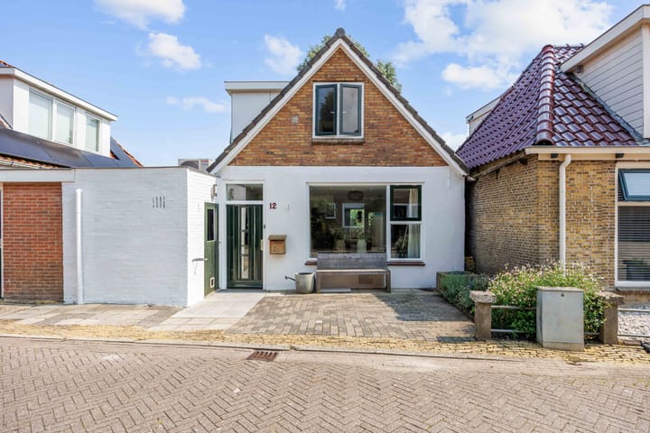 Photo of property Tsjerkebuorren 12, Sexbierum