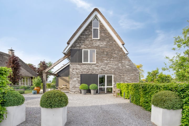 Photo of property Veenerf 36, Nijkerkerveen