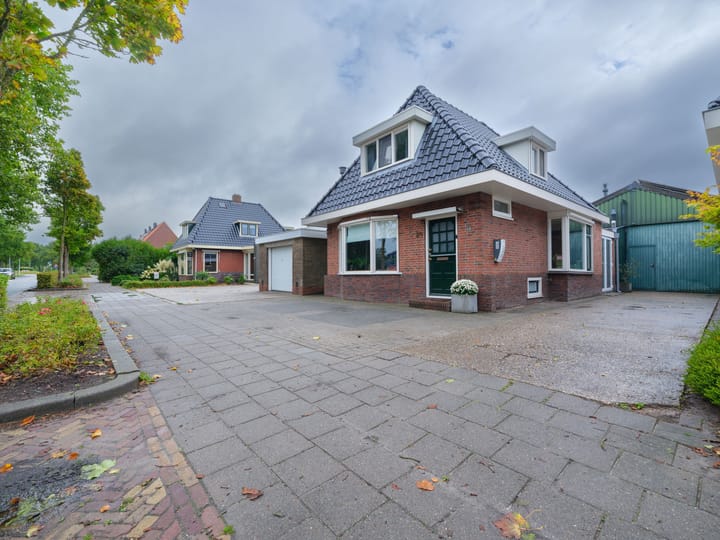 Photo of property Vierhuisterweg 24, Surhuisterveen