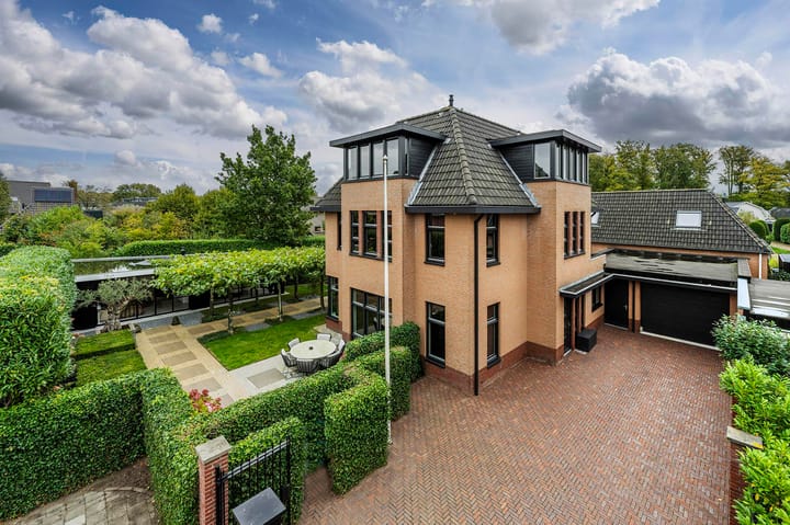 Photo of property Zandheuvel 15, Kortenhoef
